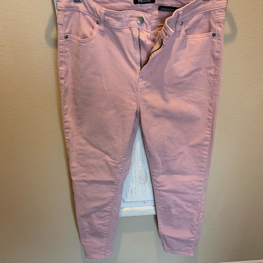 Blush pink high rise skinny jeans. Never worn.